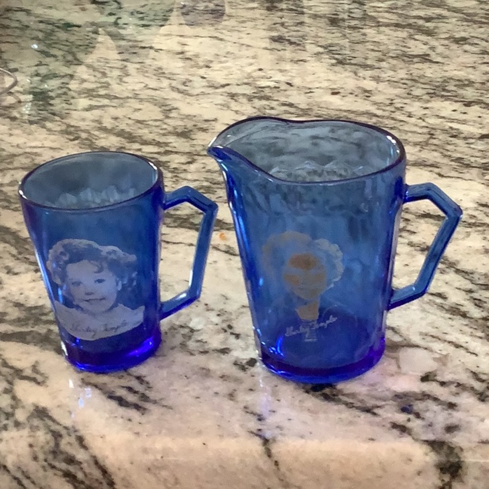 Vintage 1930’s Shirley Temple blue glass creamer and cup. No chips or cracks